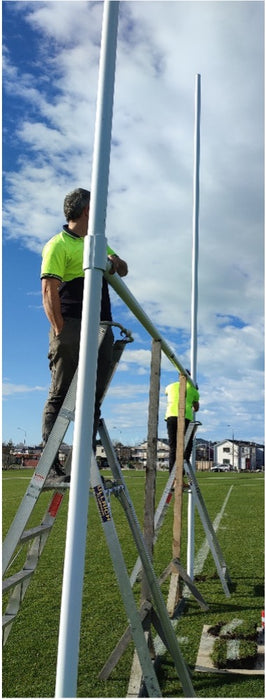 Perennial aluminium rugby post with hinge base, crossbar being attached